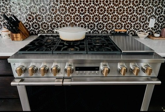 Design consulting — professional range with geometric tile backsplash